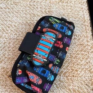 ZIPIT brand fanny pack or hip pouch, featuring a vibrant skateboard pattern